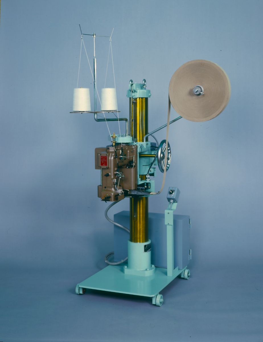 NEWLONG A2-P2L Bộ chân trụ, đầu máy may bao Newlong 